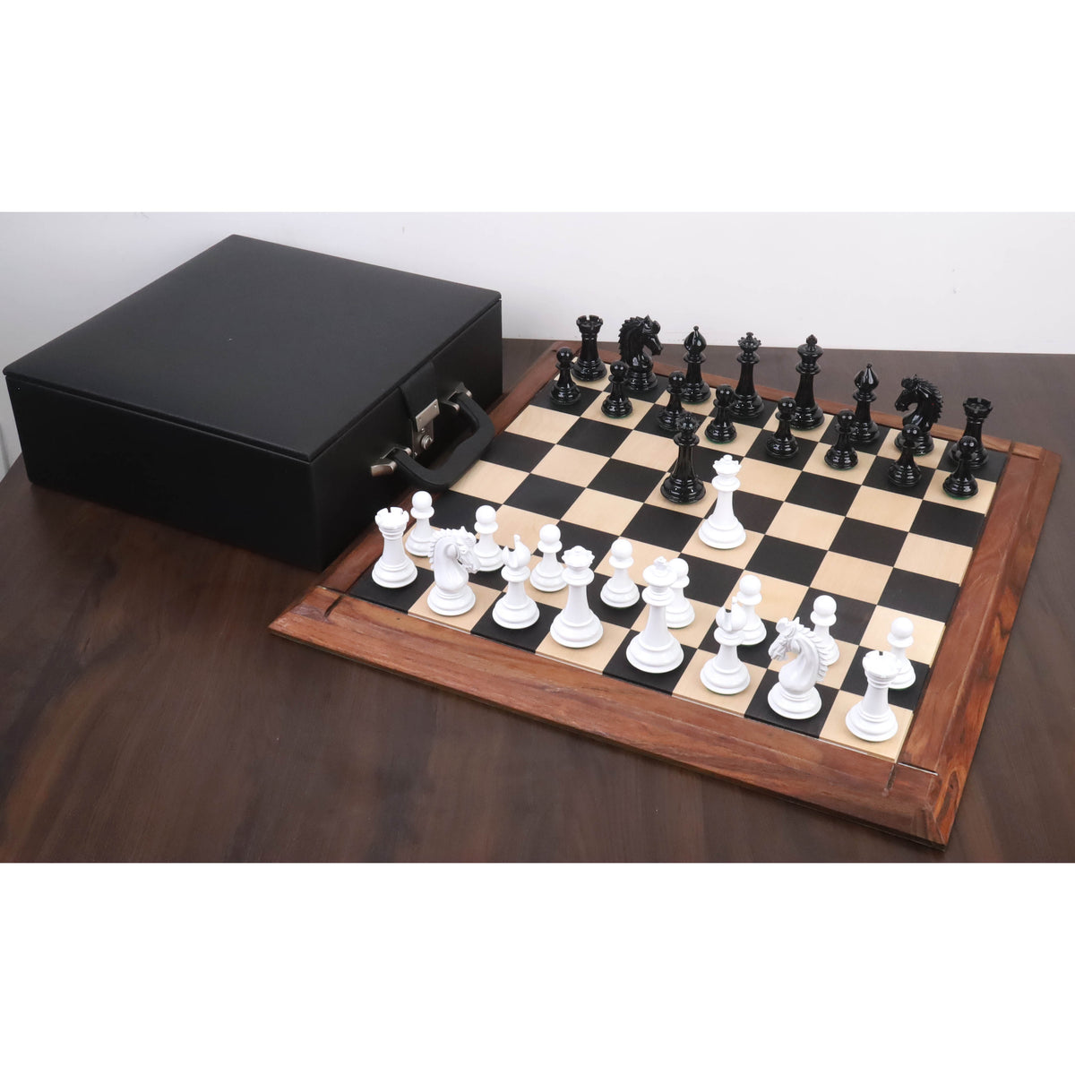 Full set of 4.1 inch texture painted Staunton chess pieces set up on a chessboard beside a black storage box.