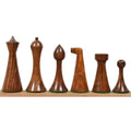 Side profile of weighted Herman Ohme minimalist chess pieces in golden rosewood and boxwood.