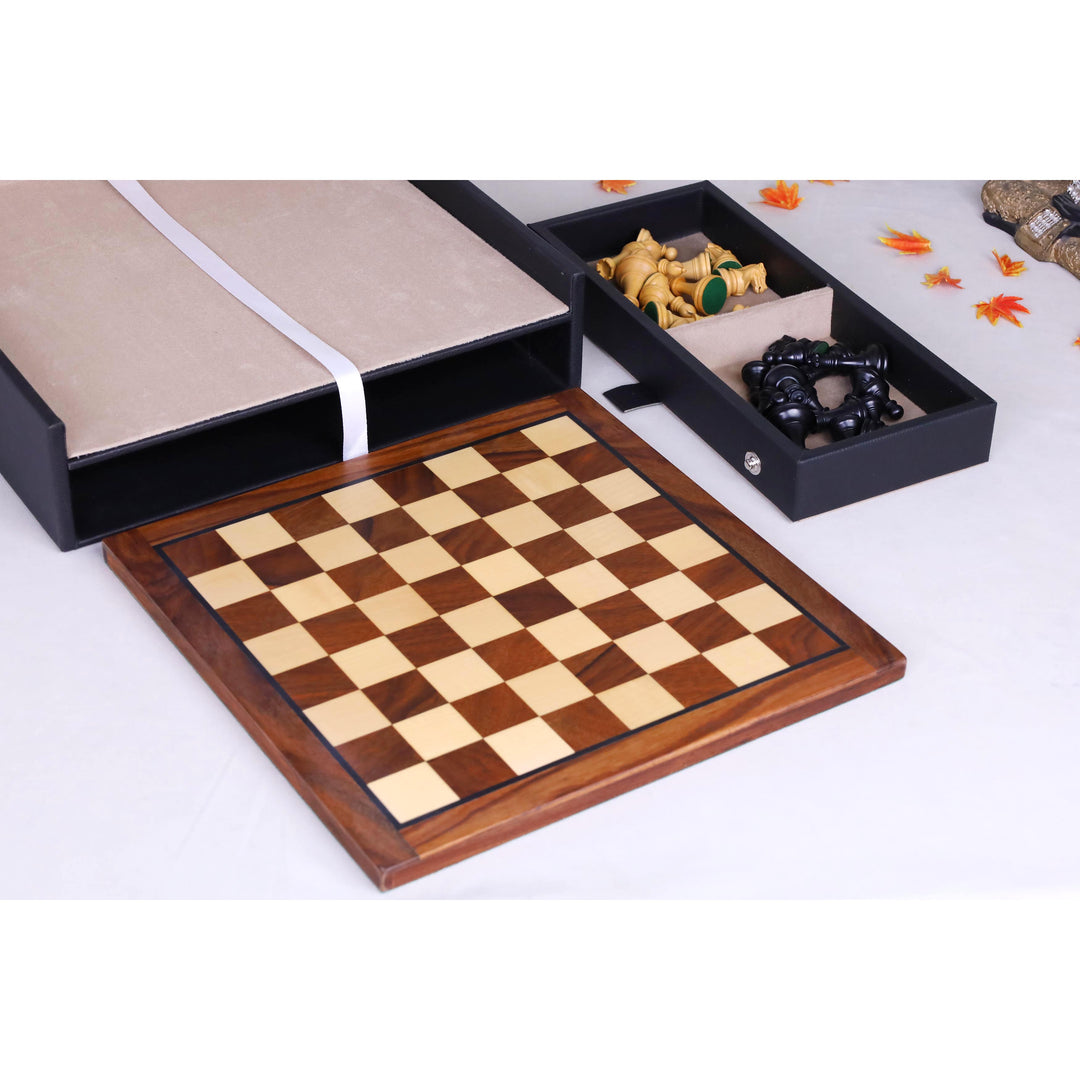 Detached ebonised boxwood and maple magnetic chess board next to its leatherette storage case.