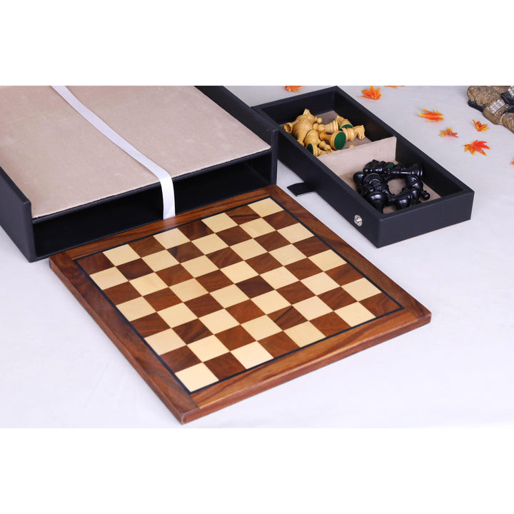 Detached ebonised boxwood and maple magnetic chess board next to its leatherette storage case.