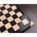 High-angle perspective of the premium Ebony and Maple wood chessboard highlighting the smooth finish and 55mm square size.