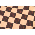 Macro shot of the alternating Tiger Ebony and Maple printed squares on a professional-grade chess board.