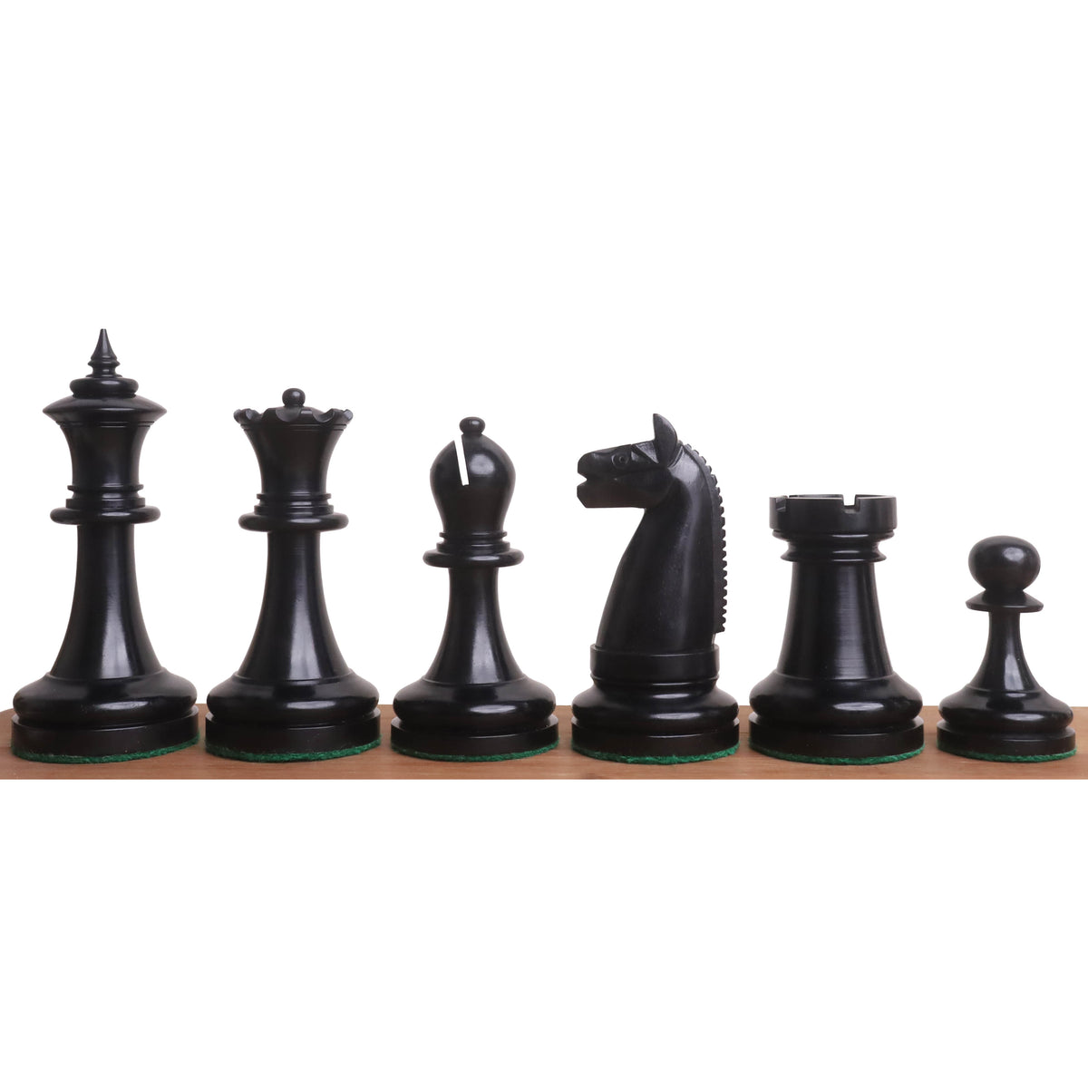 Detailed view of black 1900s American Chess Company pieces.