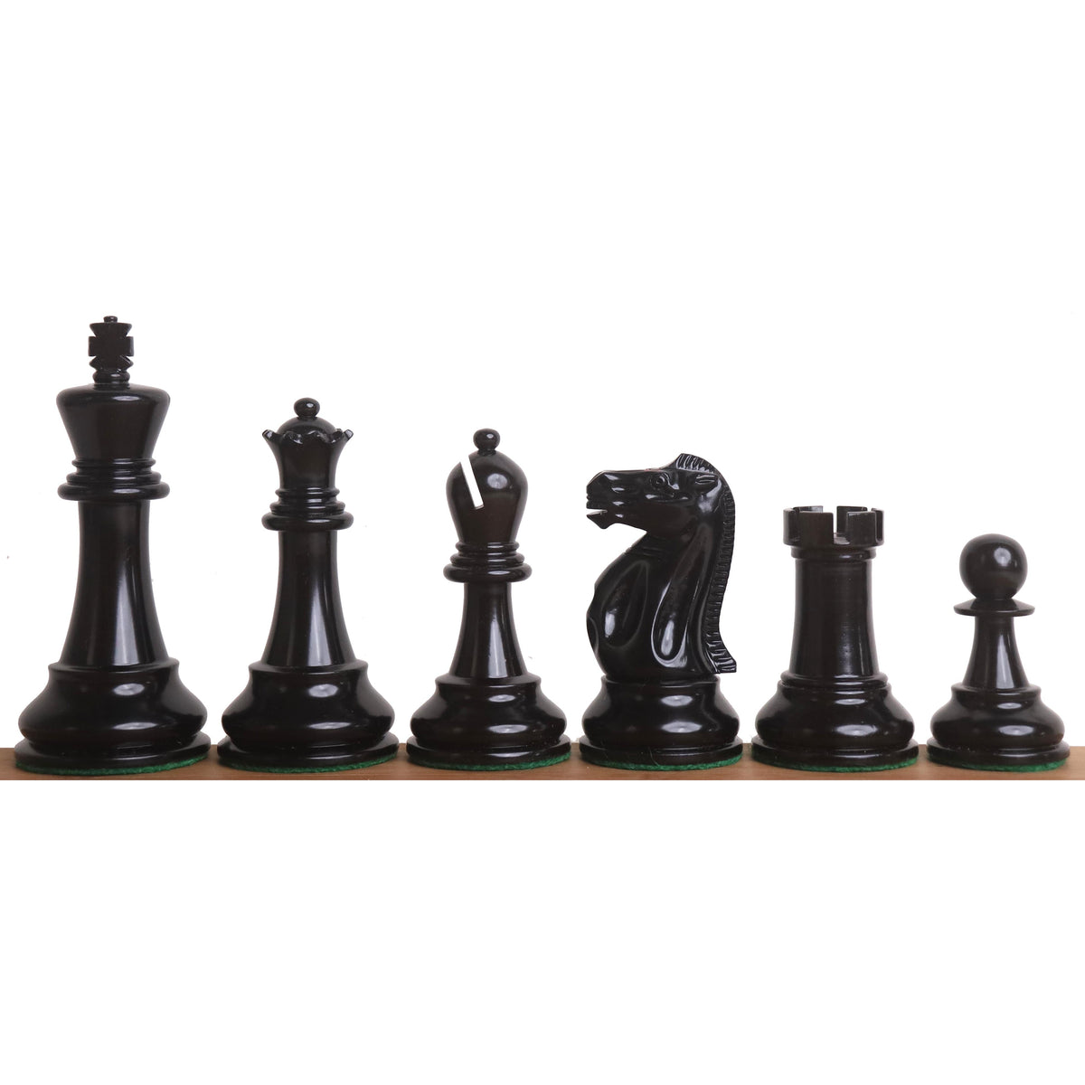 Set of elegant black ebony Lessing Staunton chess pieces.