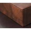 Detailed texture of the premium brown leather chess piece storage box.