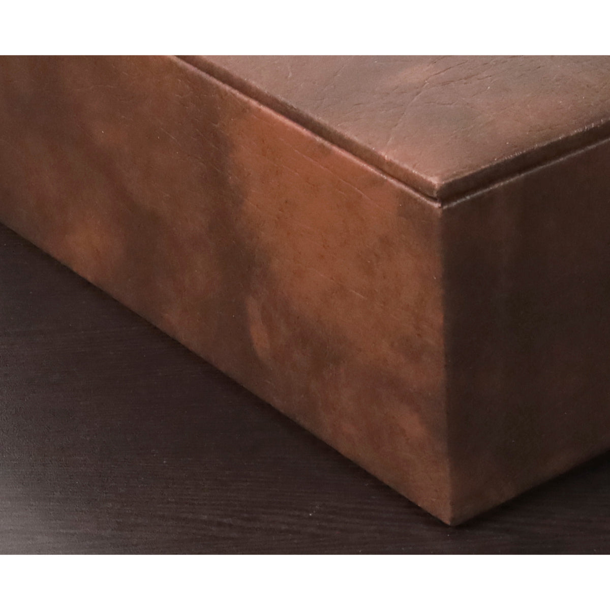 Detailed texture of the premium brown leather chess piece storage box.