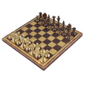 A complete 12" luxury brass chess set with copper and gold pieces arranged on a matching decorative metal board.