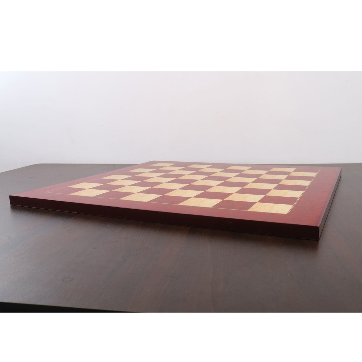 Side profile view of the 21-inch Red Ash Burl printed chess board showcasing its thickness and flat playing surface.