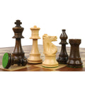 Improved French Lardy chess pieces displayed on a wooden board.