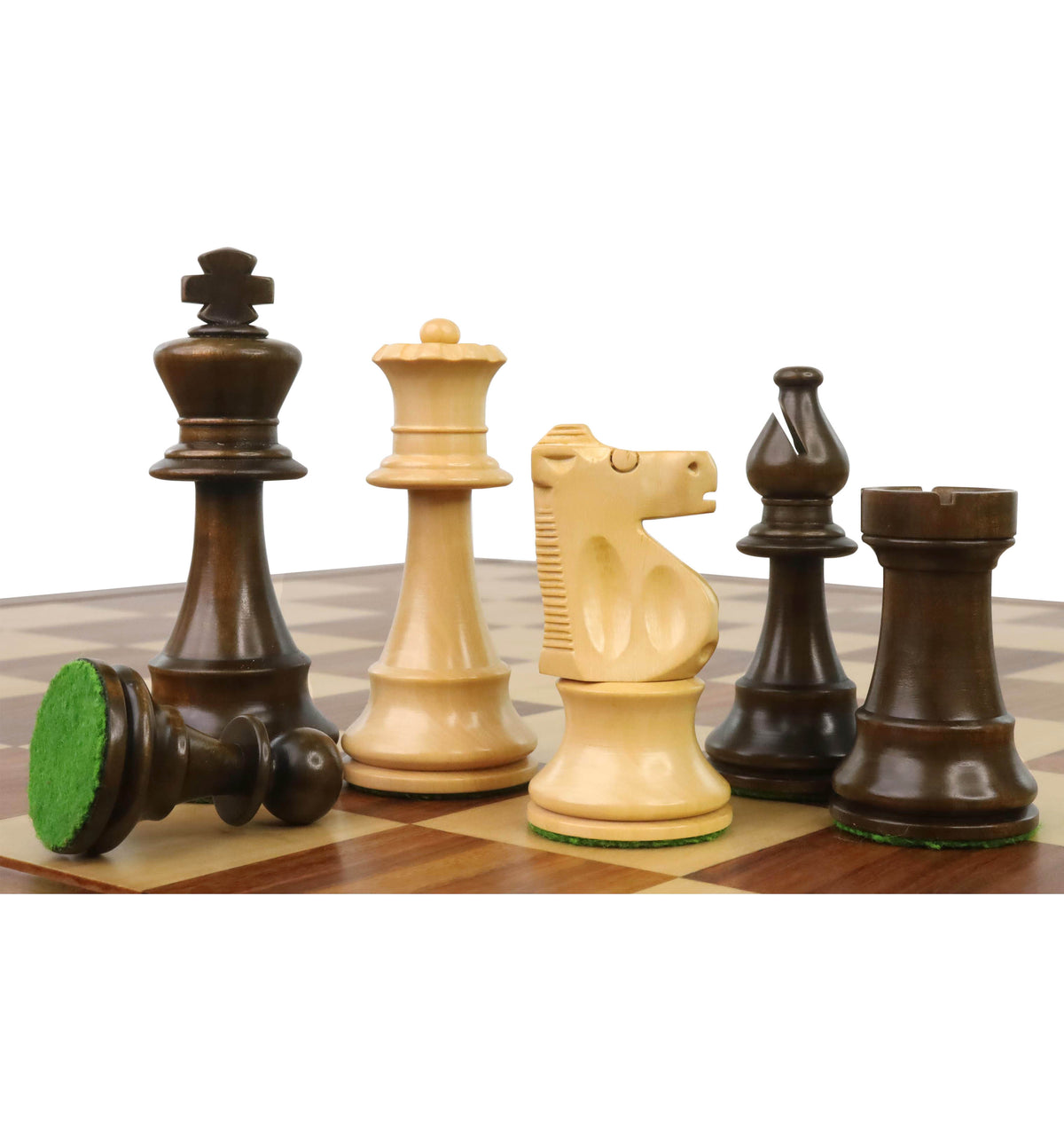 Improved French Lardy chess pieces displayed on a wooden board.
