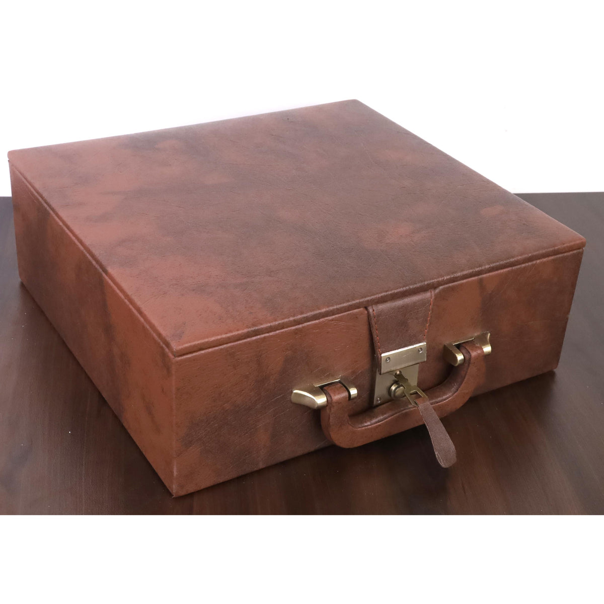 Premium brown leatherette chess piece storage box with metallic brass hardware.