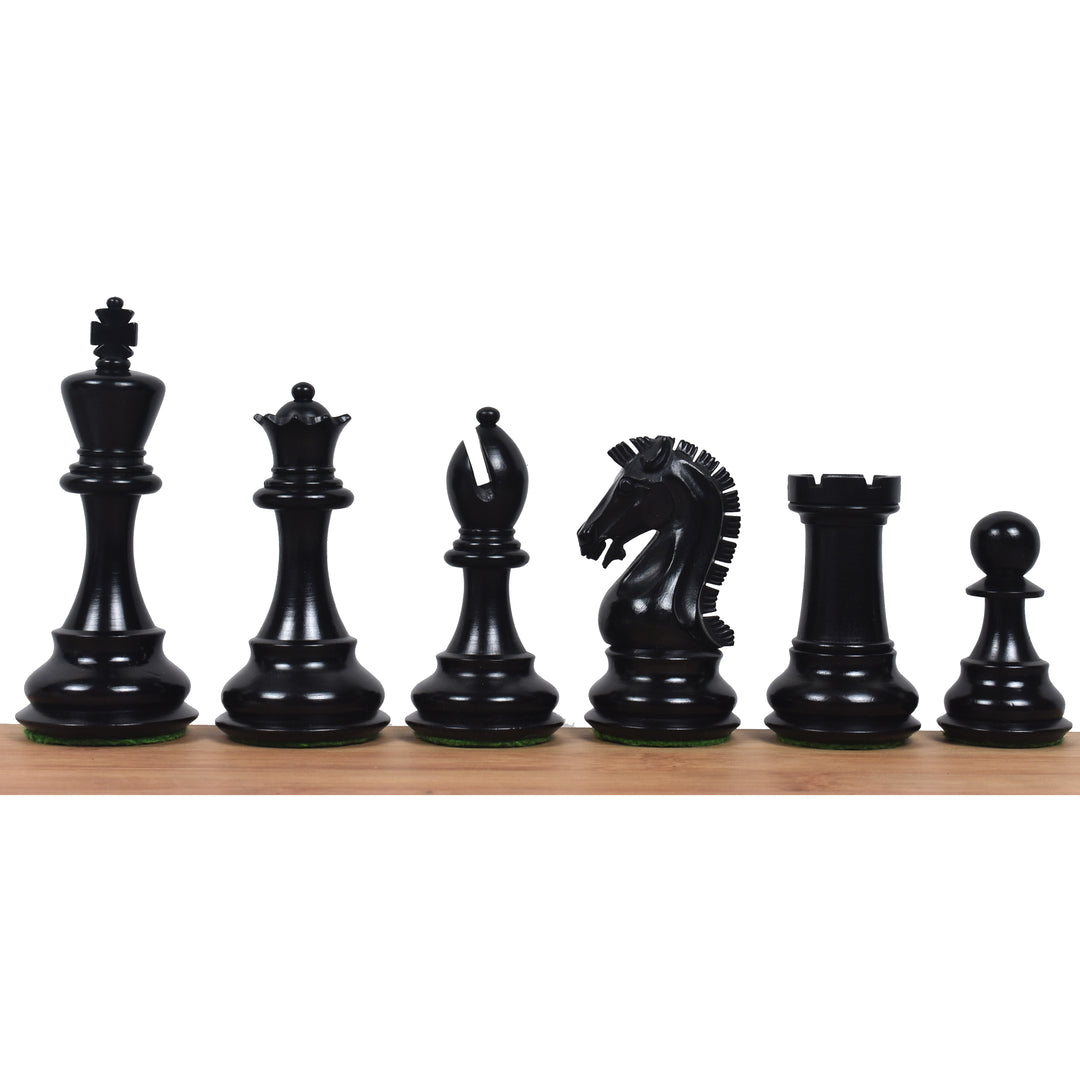 Dark ebonised boxwood pieces of the 3.9" Craftsman Staunton chess set lined up from King to pawn.
