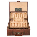 Open leatherette storage box featuring custom velvet-lined interior slots for safe piece storage.
