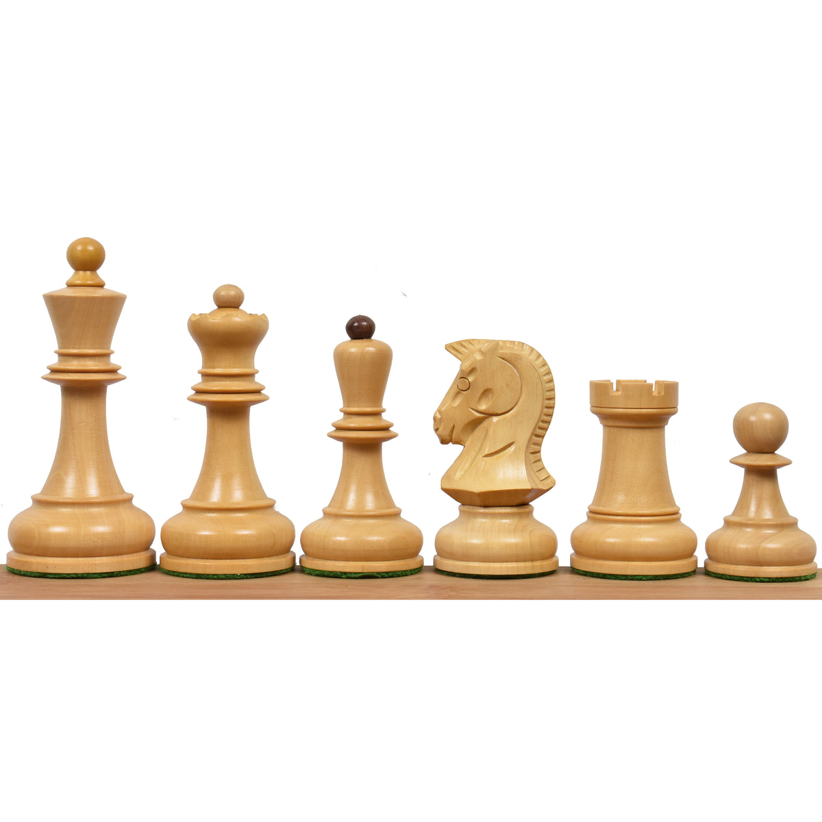Full set of boxwood Dubrovnik chess pieces arranged in a row.