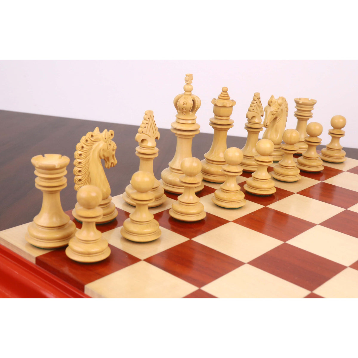 Detailed view of the 4.5-inch boxwood chess pieces from the Carvers' Art collection.
