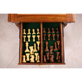 Top-down view of the 4.1" Pro Staunton Golden Rosewood pieces organized within the felt-lined drawer.