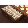 Close-up of the velvet-lined storage drawer interior for a 20-inch chess board.