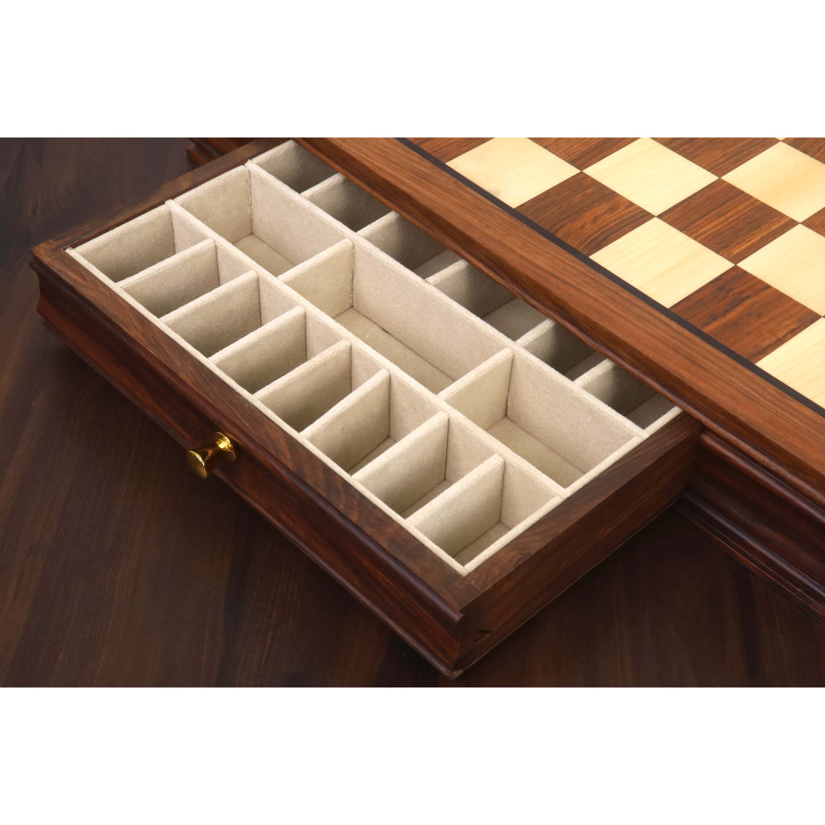 Close-up of the velvet-lined storage drawer interior for a 20-inch chess board.