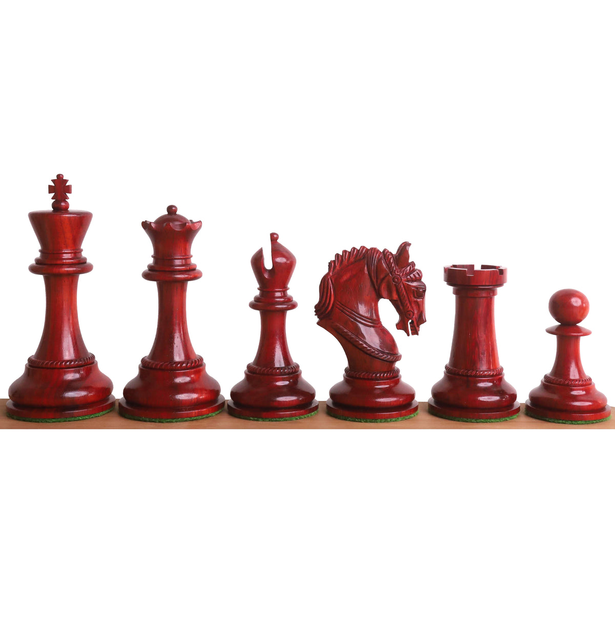 Detailed view of the full set of bud rosewood Imperator Staunton chess pieces.