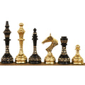 Side profile of handcrafted Soviet brass metal luxury chess pieces.