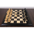 Piatigorsky Cup ebony and boxwood chess pieces arranged on board.