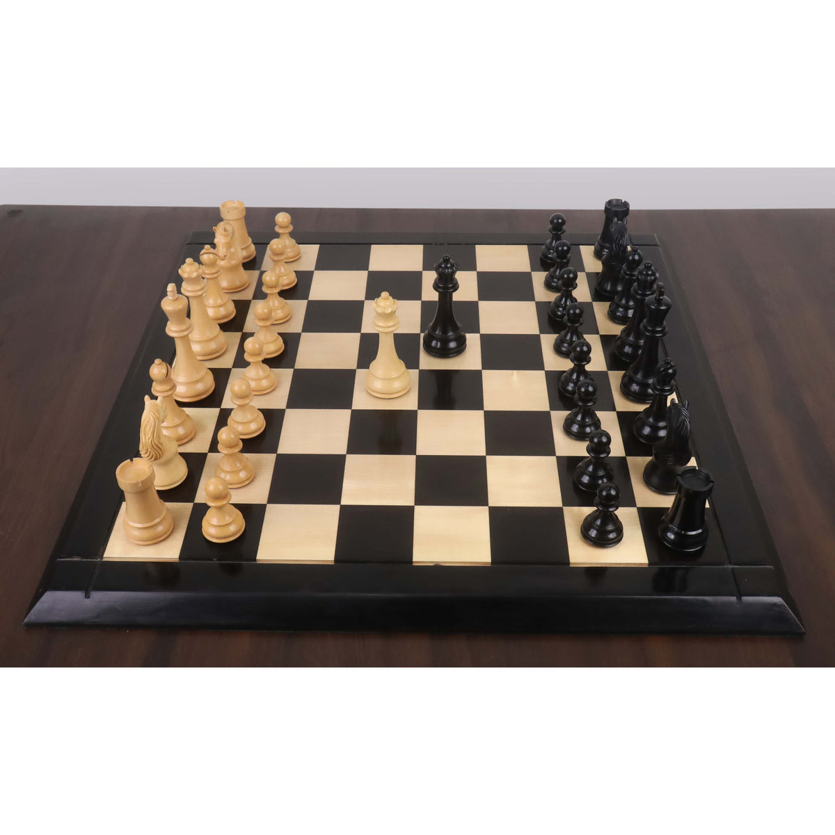 Piatigorsky Cup ebony and boxwood chess pieces arranged on board.