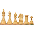 Close-up of boxwood Craftsman Staunton pieces lined up in a row.