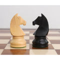 Detailed carving of Staunton knights in natural boxwood and ebonised black finish.
