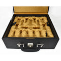Open premium black leatherette chess box with gold velvet interior.