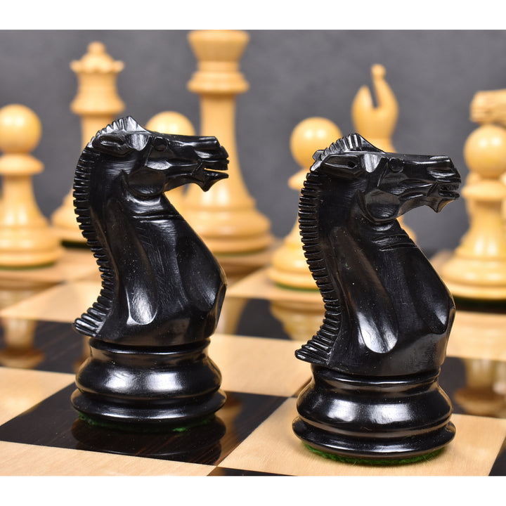 Hand-carved black ebony knight chess pieces showcasing detailed craftsmanship.