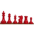 Full set of red 3.75-inch Staunton chess pieces lined up on display.