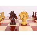 Close-up side view of wooden Staunton knight chess pieces.