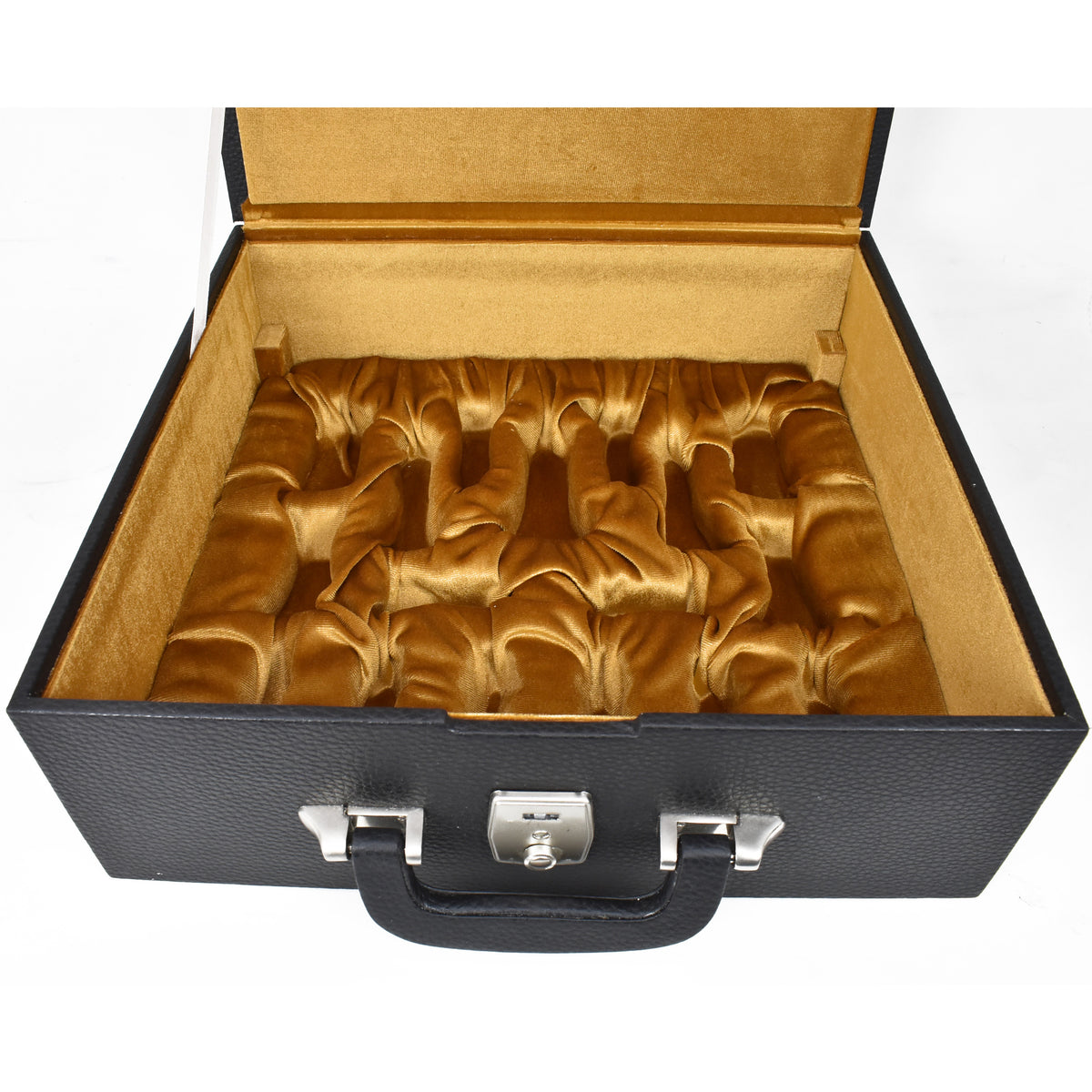 Interior view of an empty chess storage coffer with gold velvet lining.