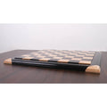 Side profile view of the 21 inch luxury chessboard showing the elevated playing surface and green felted base.