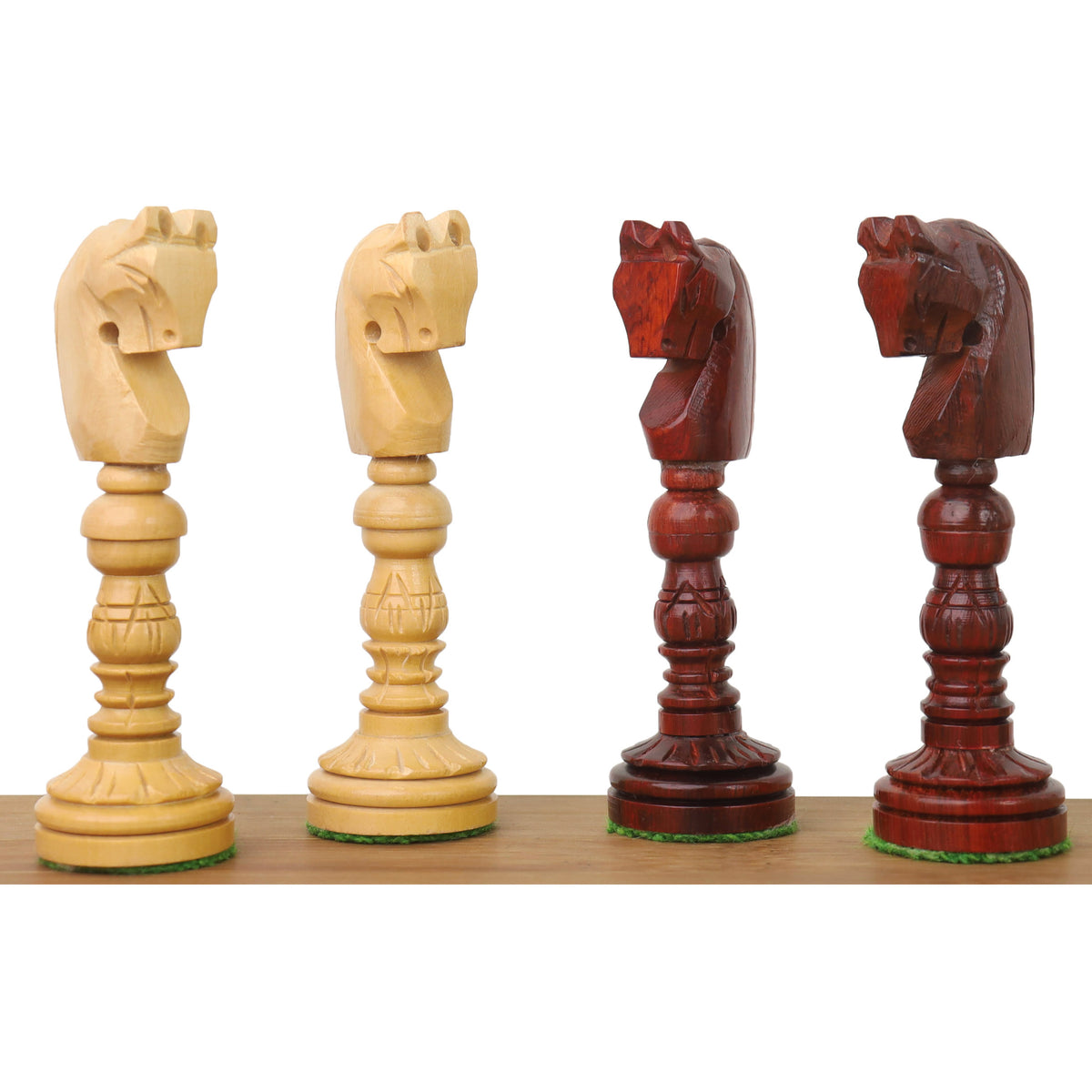 Close-up of intricately hand-carved Bud Rosewood and Boxwood Lotus Series knights.