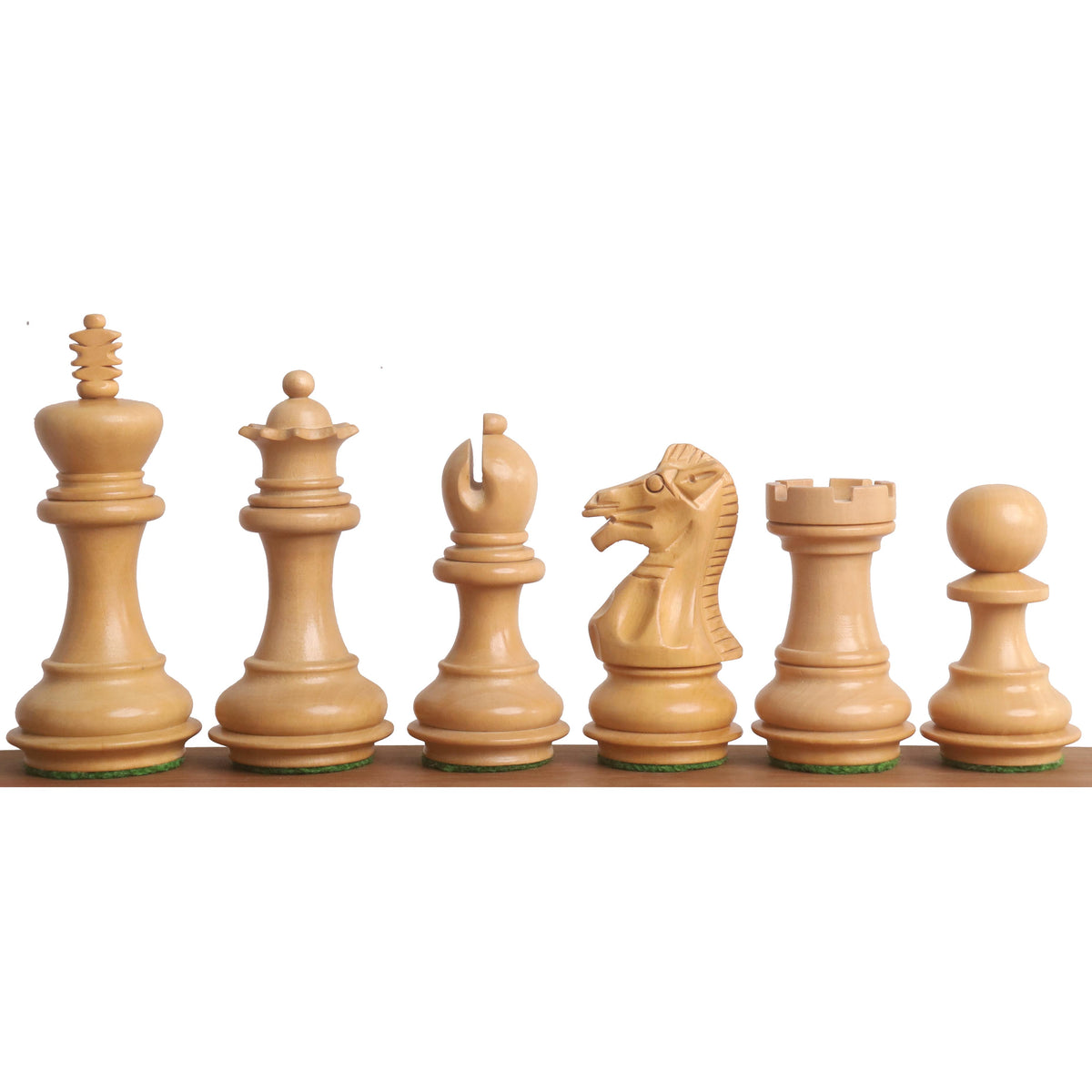 Full set of 3.2 inch weighted boxwood Staunton chess pieces on a wooden surface.