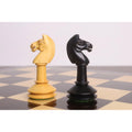 Side profile comparison of a boxwood and an ebonised knight from the Monolith miniature chess collection.