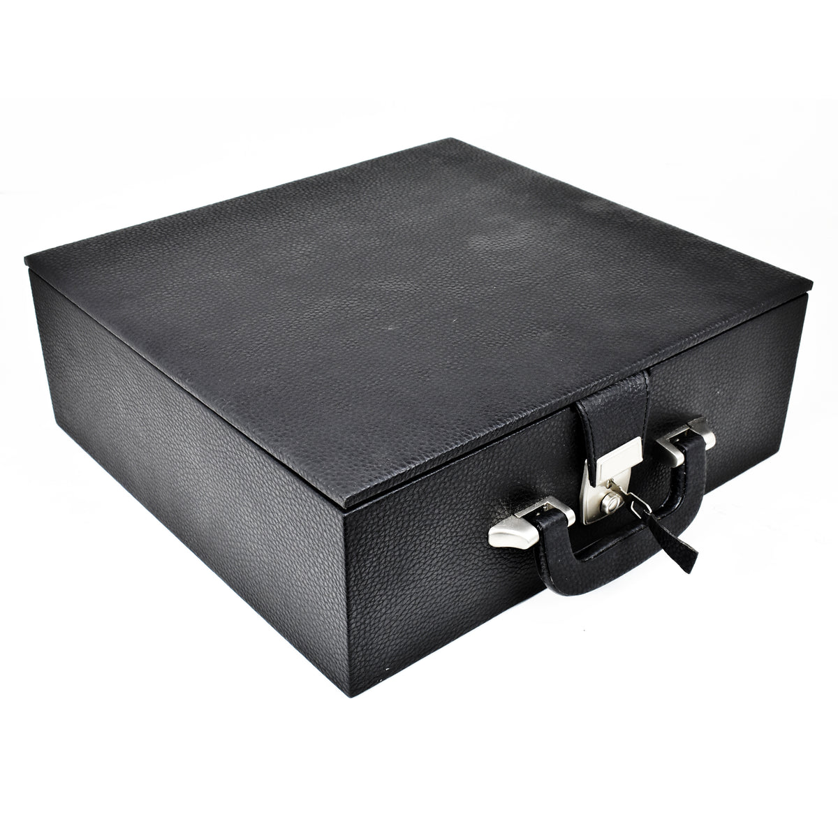 Angled view of the closed black leatherette chess storage box with a silver lock, keeping pieces secure.