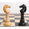 Detailed view of boxwood and ebony knights from the Edinburgh northern upright pre-Staunton chess set.