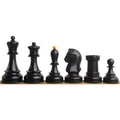 Close-up of black antiqued boxwood 1950s Fischer Dubrovnik chess pieces.