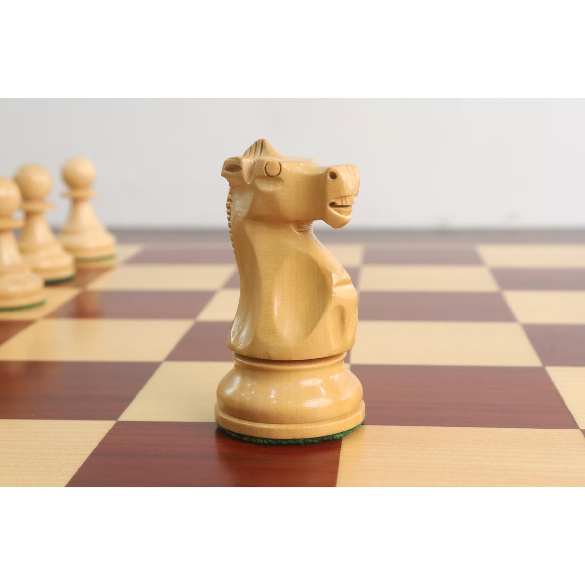 Detailed view of the handcrafted Boxwood Knight piece showing the distinct 1972 style carving.