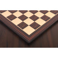 High-angle corner shot showing the sleek profile and matte texture of the 21-inch Tiger Ebony and Maple chess board.