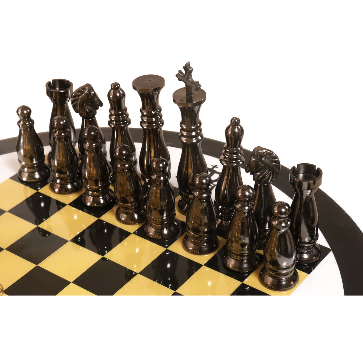 Dark metallic chess pieces positioned on the handcrafted wooden board squares.