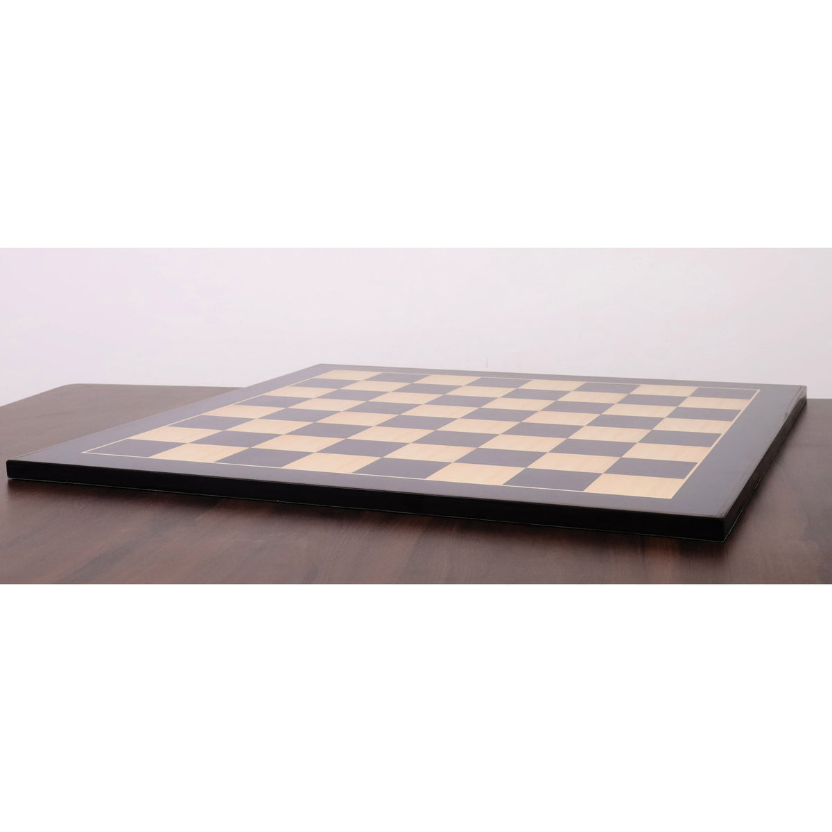 Side profile of a 26 inch ebony and maple wood printed chess board showcasing its sleek, flat design.