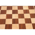 High-quality texture detail of the matte finish on the 25-inch Golden Rosewood chess board squares.