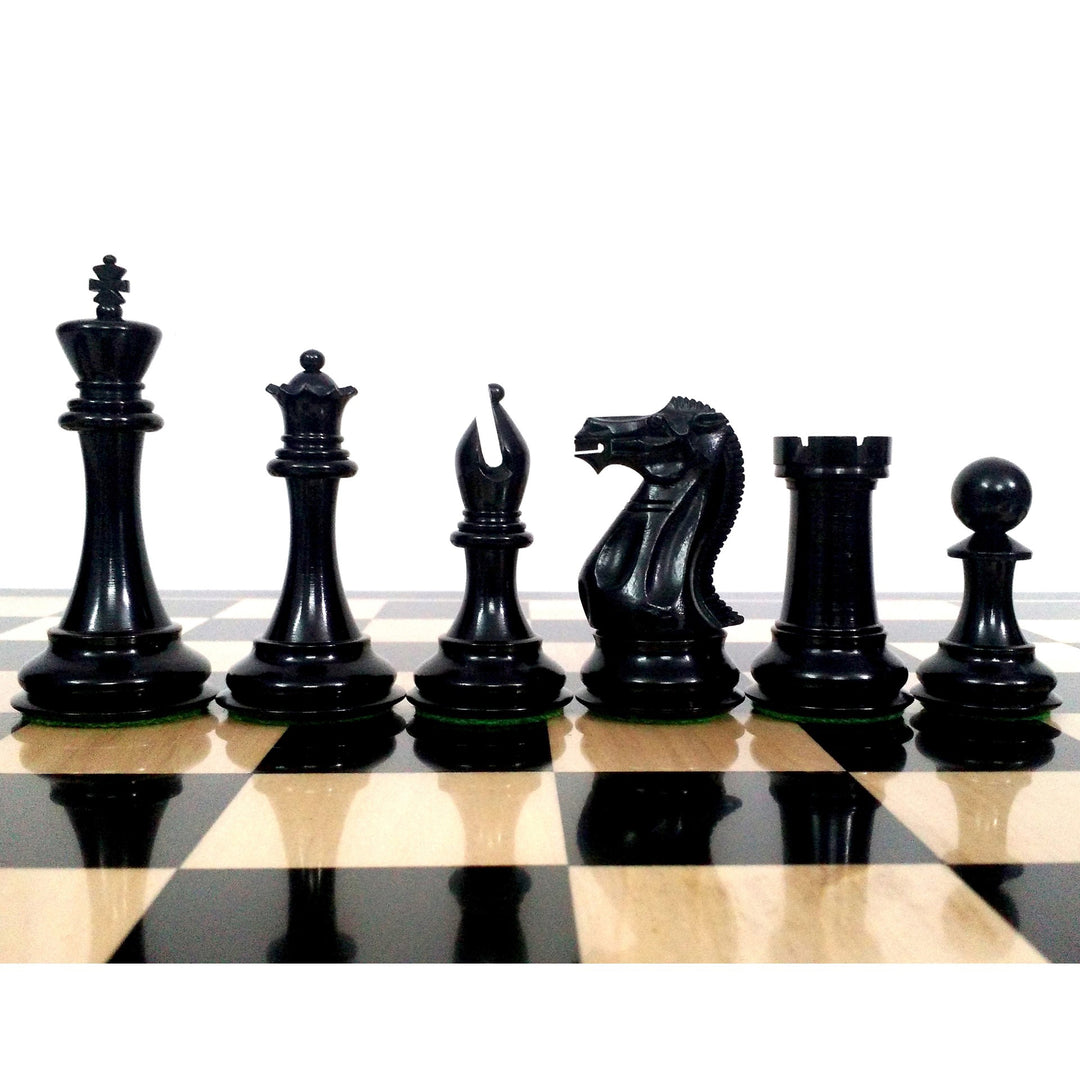 Dark ebony Sleek Staunton chess pieces in profile view on an ebony chessboard.