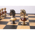 Detailed side profile of the metallic gold and grey Knights of the Victorian Fusion brass metal luxury chess set.