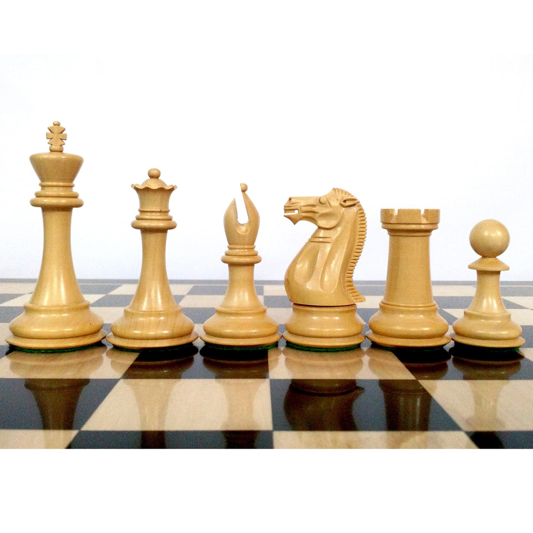 Natural boxwood Sleek Staunton chess pieces in profile view on a wooden chessboard.