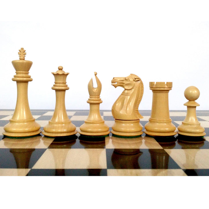 Natural boxwood Sleek Staunton chess pieces in profile view on a wooden chessboard.