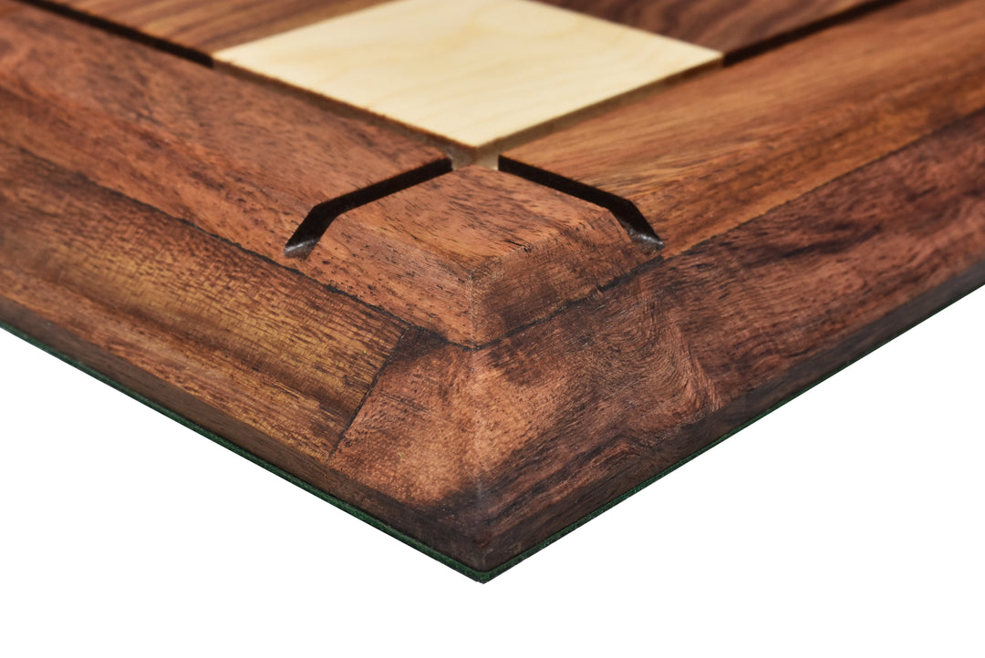 Detailed shot of the handcrafted raised border and corner grooves of a Drueke style chess board.